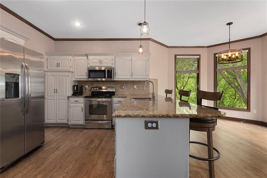 5501 Northeast Oaks Ridge Lane Lee's Summit, MO 64064 - Photo 8 of 44