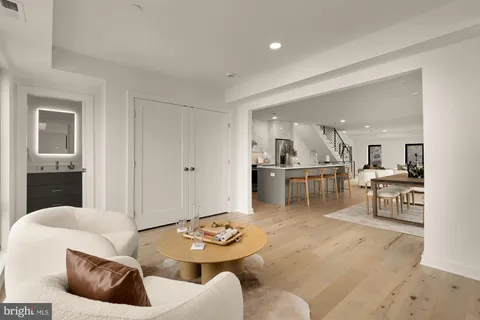 a living room with furniture and a table