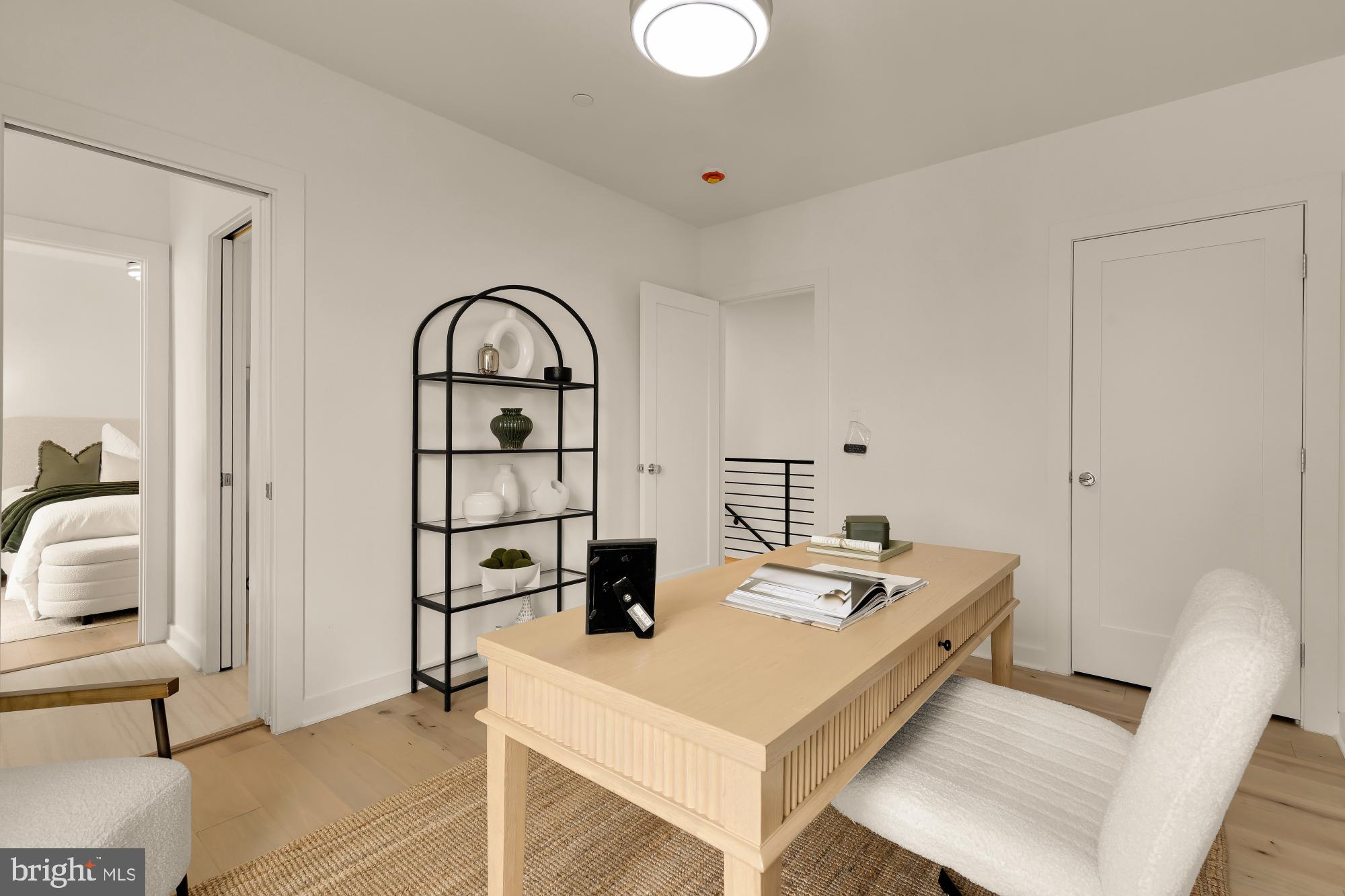 641 Quebec Place Northwest, Unit 2 Washington, DC 20010 - Photo 29 of 32 a view of kitchen island with furniture and wooden floor