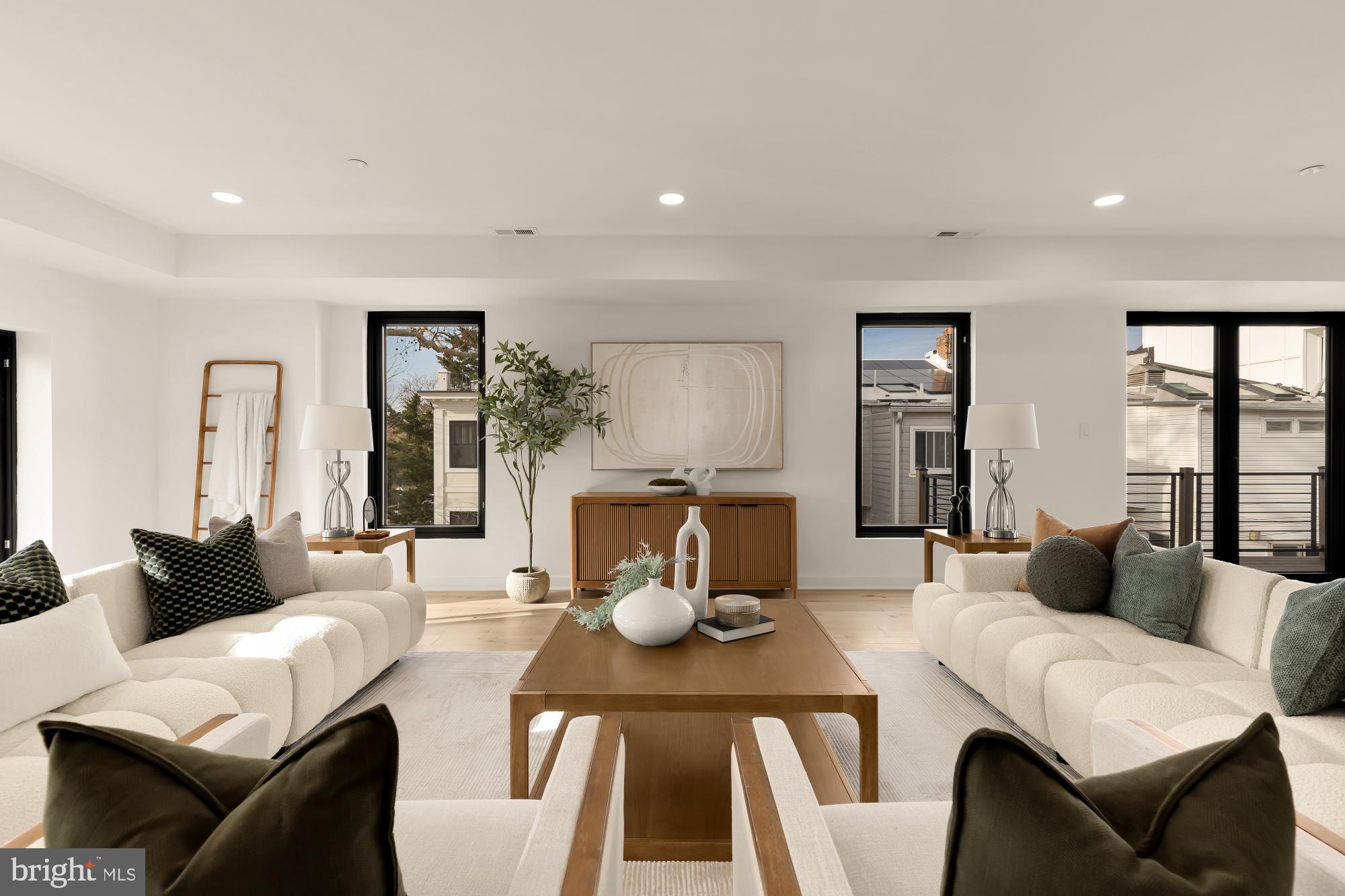 641 Quebec Place Northwest, Unit 2 Washington, DC 20010 - Photo 4 of 32 a living room with furniture and wooden floor