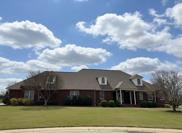 a view of house with garden