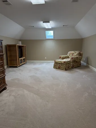 a view of a livingroom with furniture