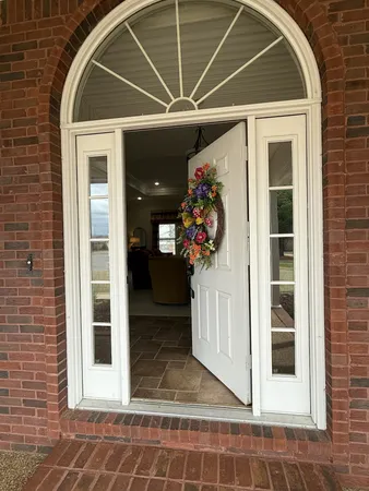 a front view of a house with a garage