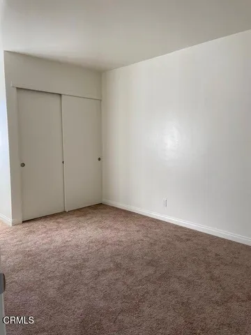 an empty room with an entryway