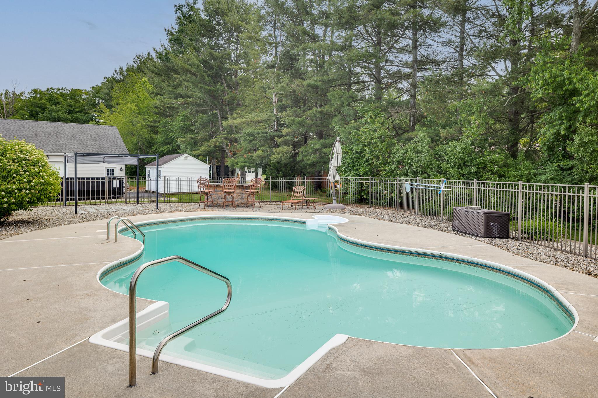 2 Dellaira Court Wrightstown, NJ 08562 - Photo 71 of 93 a view of a swimming pool with a patio and a yard