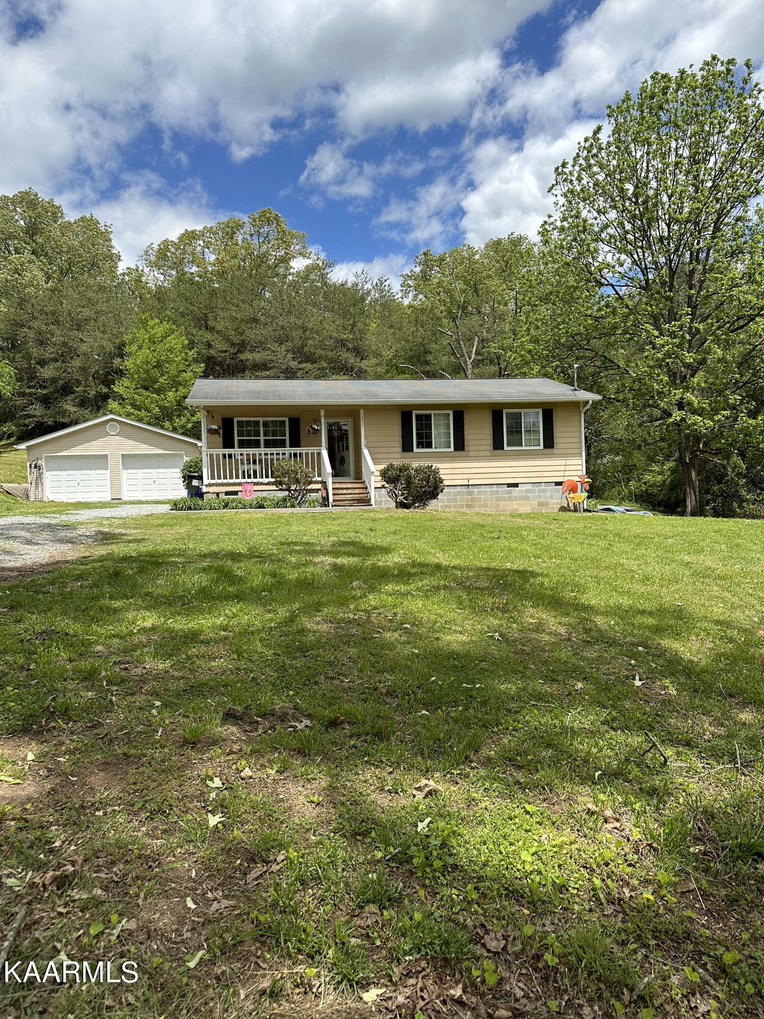 a view of a house with a big yard
