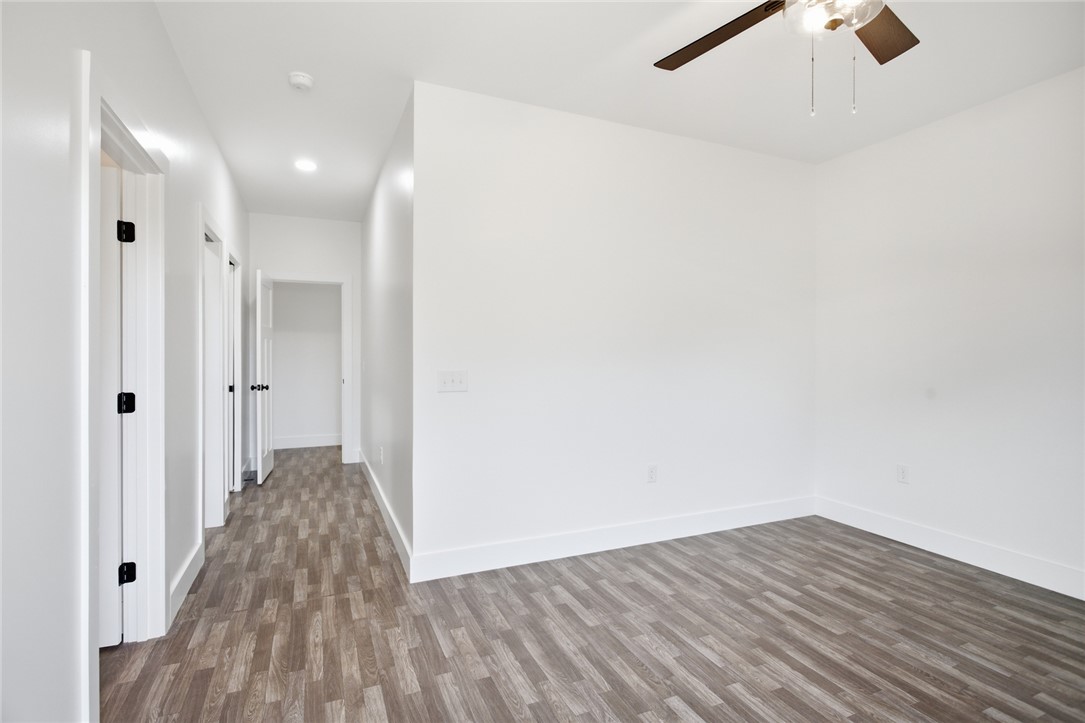 115 Riley Street Westminster, SC 29693 - Photo 14 of 46 Bright interior space features stylish flooring, offering a blank canvas for personalization.