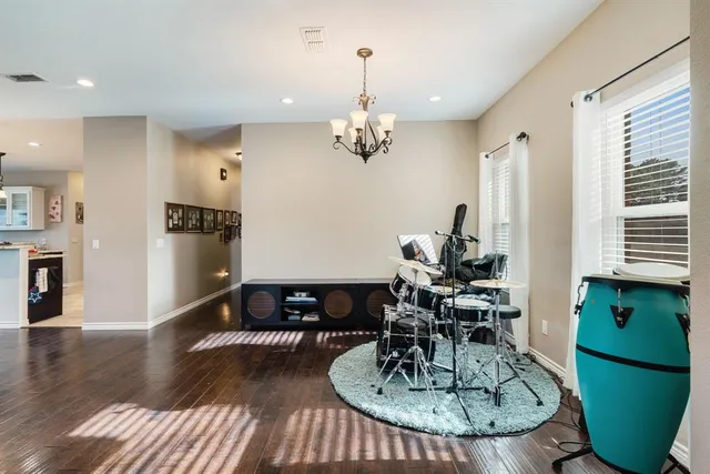 a kitchen with stainless steel appliances granite countertop a stove a refrigerator and a sink