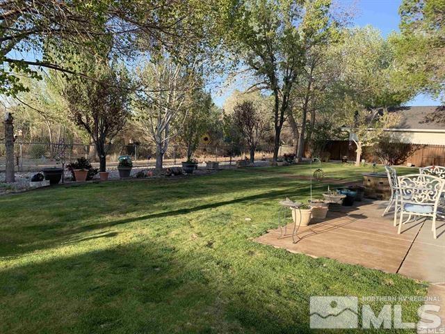 5076 Rivers Edge Drive Fallon, NV 89406 - Photo 7 of 34 a view of a park with large trees