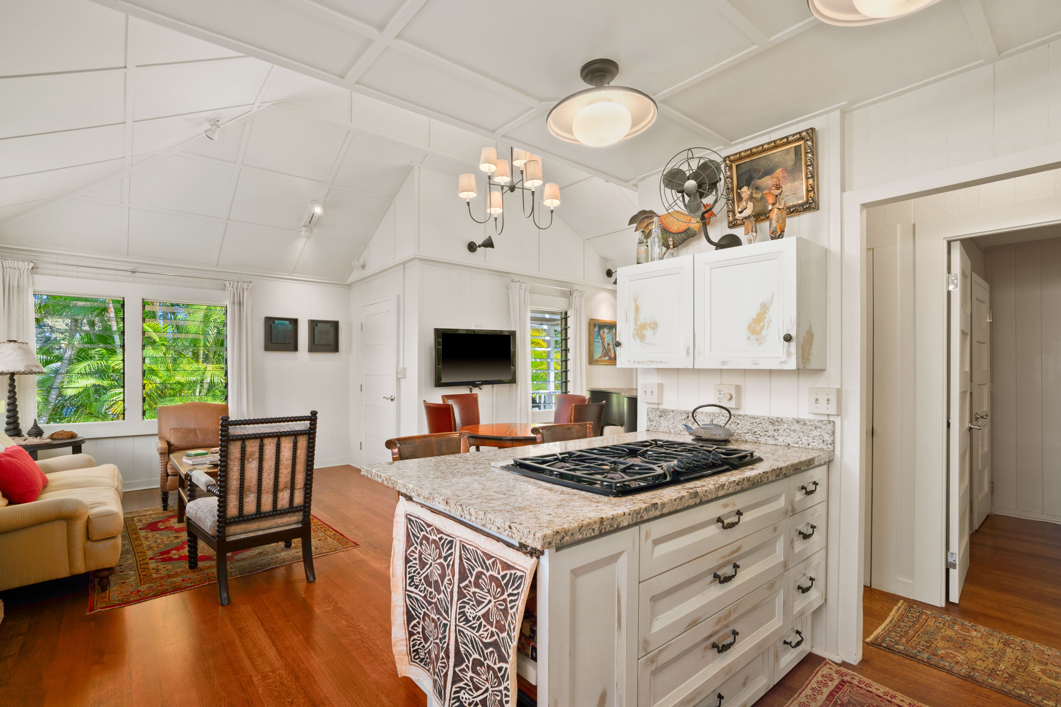 5225 Ua Road Kapaa, HI 96746 - Photo 12 of 30 a kitchen that has a stove and a table in it