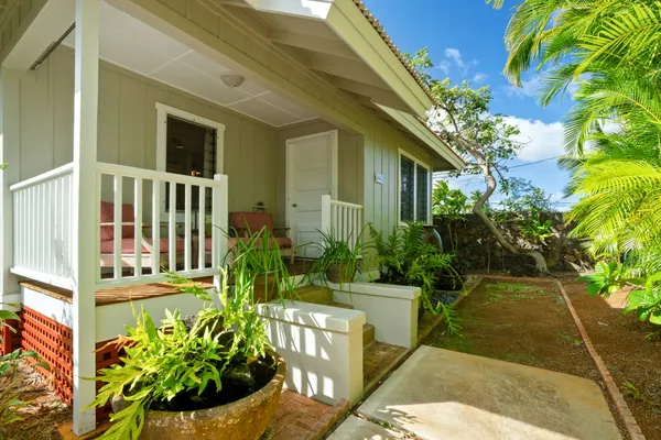 a view of a porch with a yard