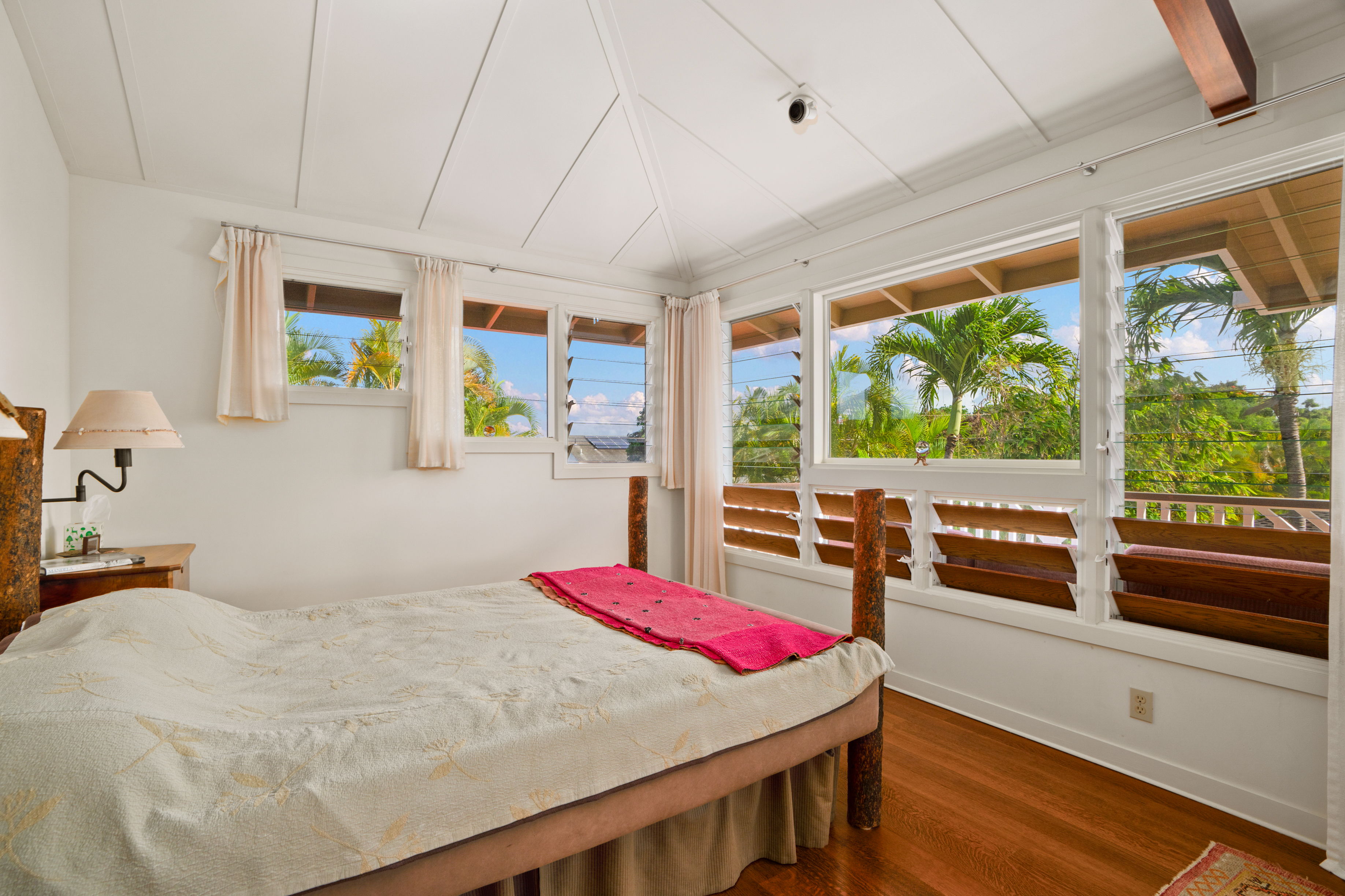 5225 Ua Road Kapaa, HI 96746 - Photo 26 of 30 a bedroom with a bed and a large window