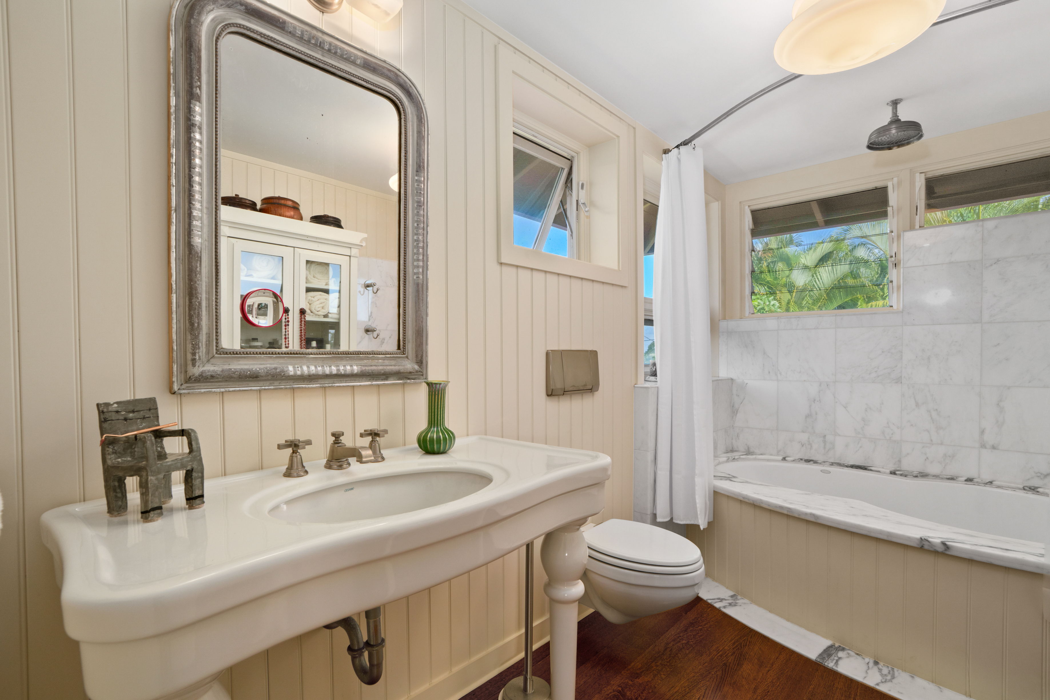 5225 Ua Road Kapaa, HI 96746 - Photo 28 of 30 a bathroom with a sink a toilet and a mirror