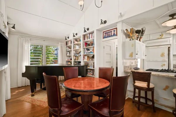 a view of a dining room with furniture window and outside view