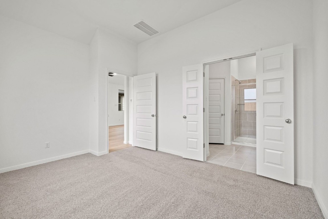 1249 Minorca Street Huffman, TX 77336 - Photo 12 of 25 an empty room with closet area