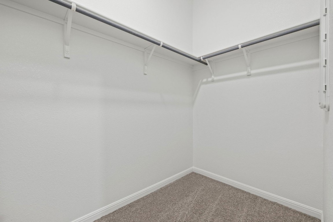 1249 Minorca Street Huffman, TX 77336 - Photo 16 of 25 a view of an empty walk in closet