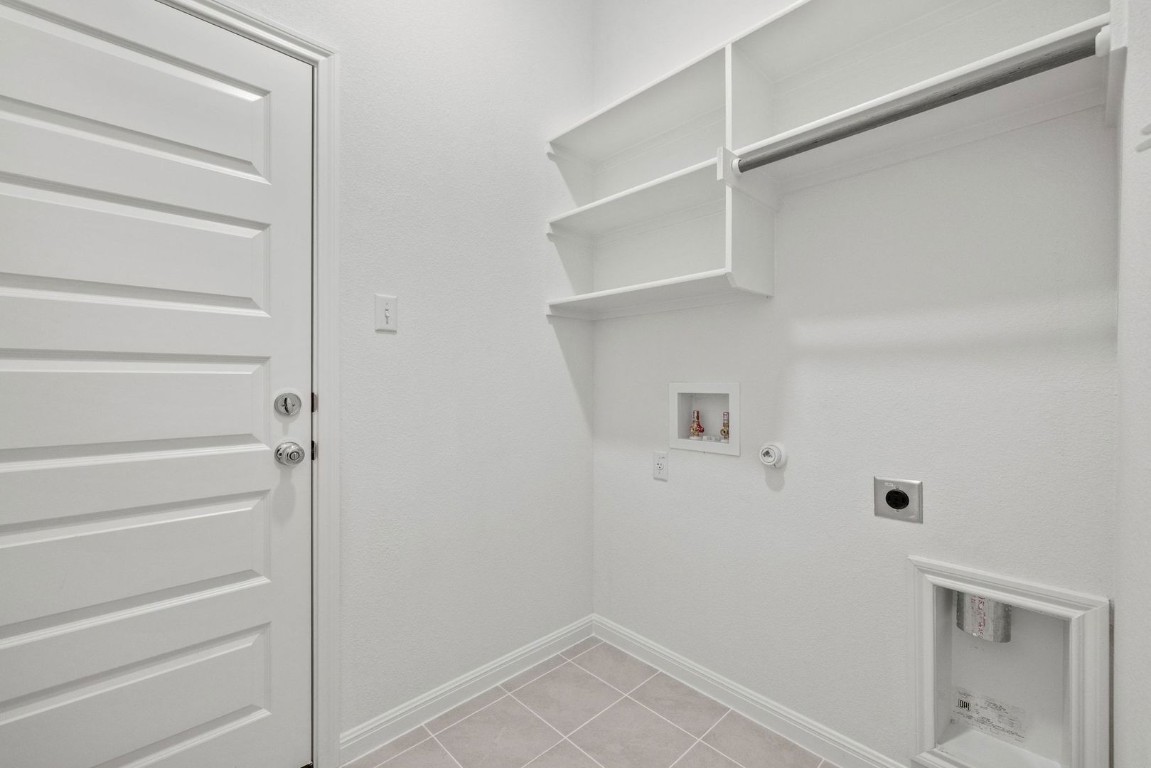 1249 Minorca Street Huffman, TX 77336 - Photo 20 of 25 a view of walk in closet with empty racks