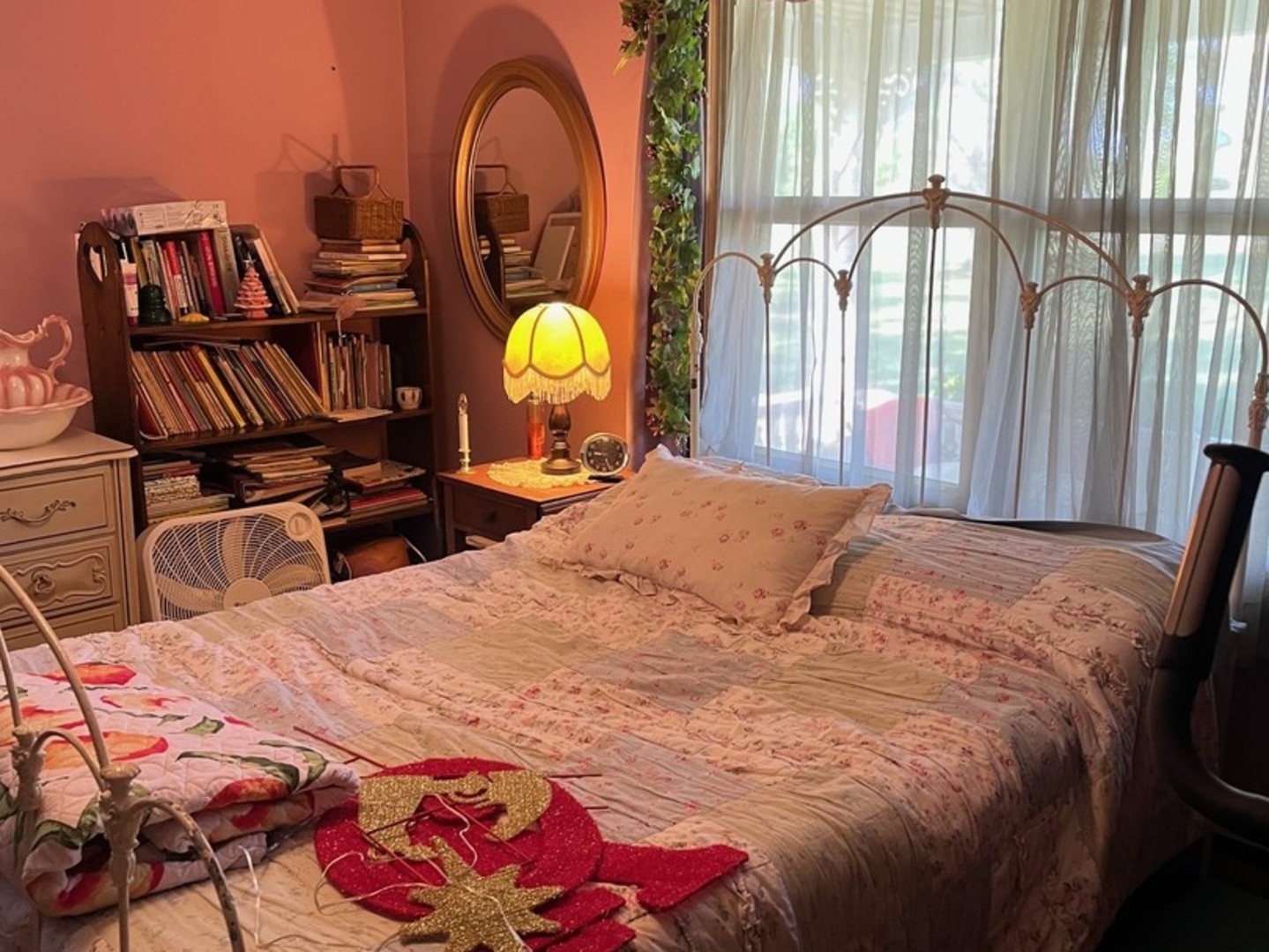 17376 Garrett Road Johnston City, IL 62951 - Photo 18 of 34 a bed sitting in a bedroom next to a window