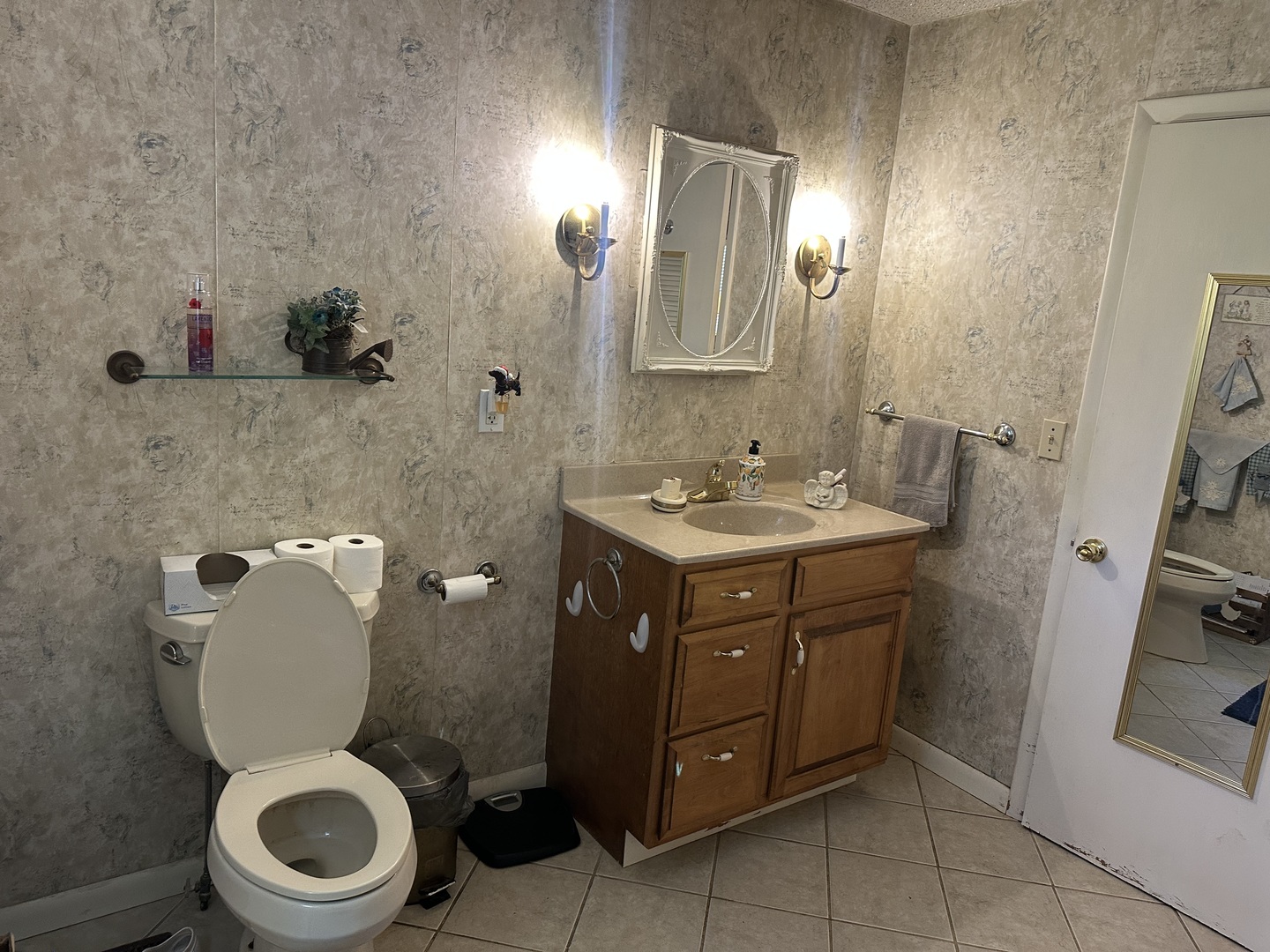 17376 Garrett Road Johnston City, IL 62951 - Photo 25 of 34 a bathroom with a toilet sink and mirror