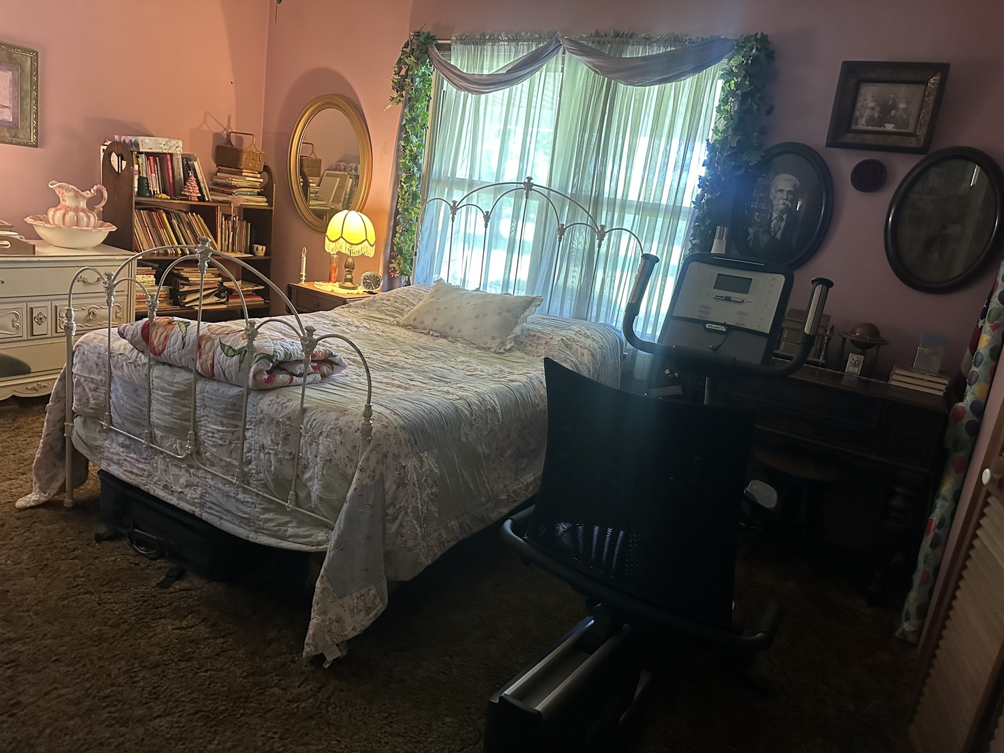 17376 Garrett Road Johnston City, IL 62951 - Photo 32 of 34 a bed sitting in a bedroom next to a window