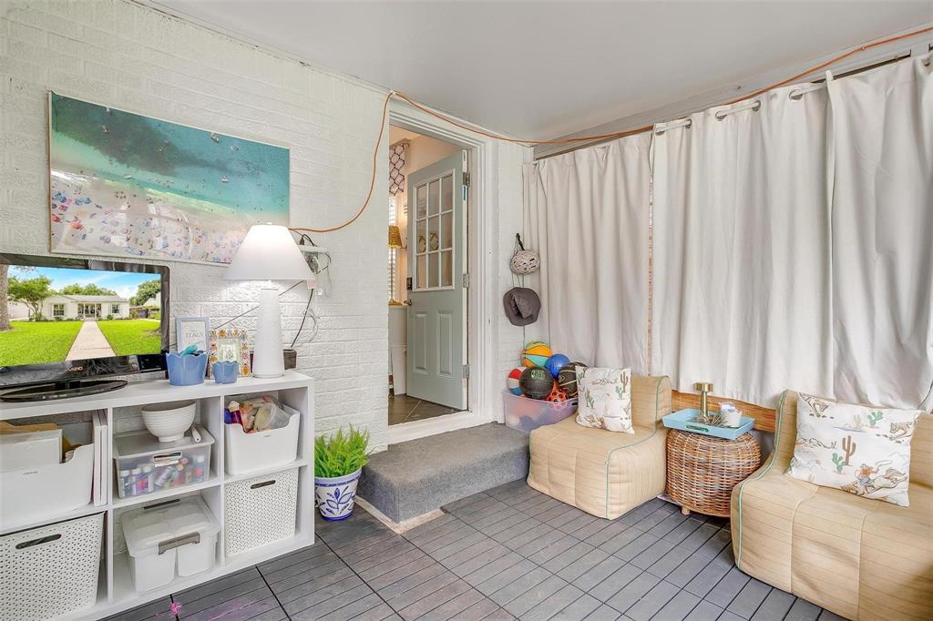 3616 Hilltop Road Fort Worth, TX 76109 - Photo 31 of 39 a living room with furniture and a window
