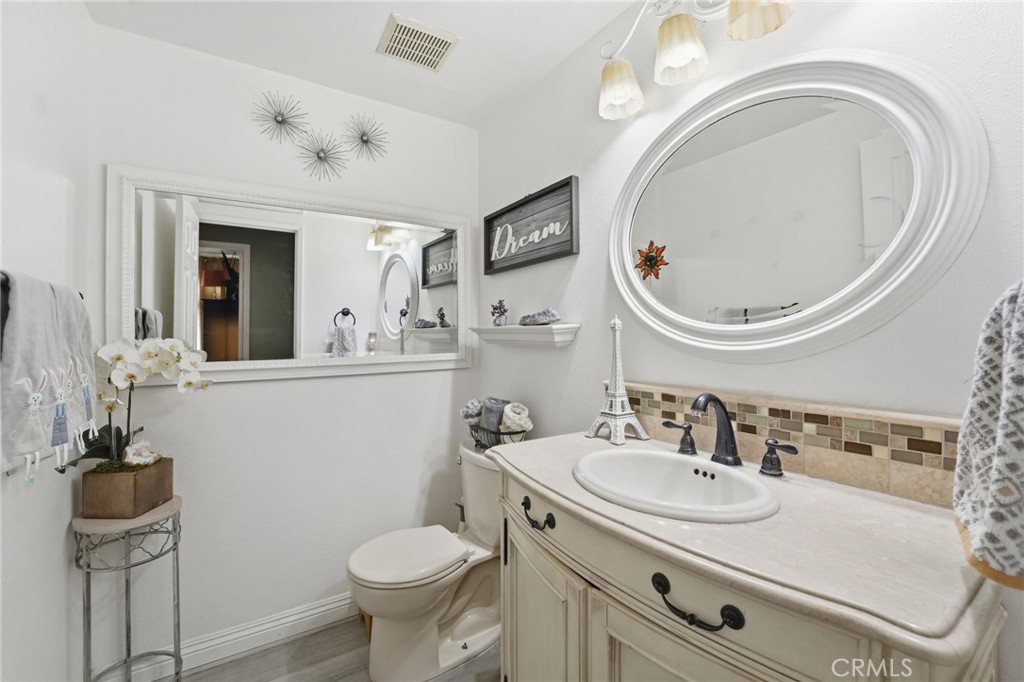 15766 Firethorn Road Fontana, CA 92337 - Photo 20 of 28 downstairs 1/2 bathroom