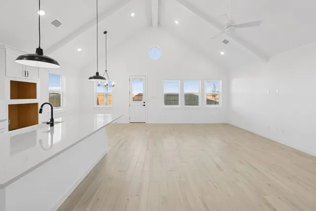 a view of a kitchen and a sink