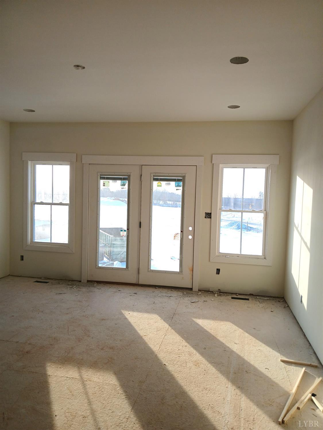 184 Zion Place Rustburg, VA 24588 - Photo 4 of 8 a view of an empty room with a window