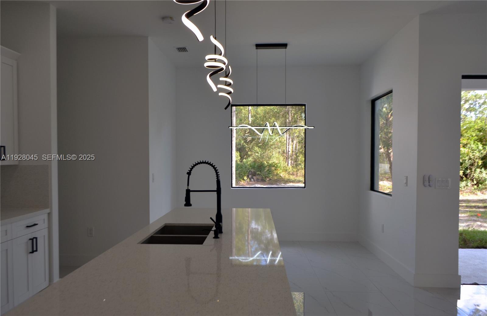 1116 Eight Street Lehigh Acres, FL 33972 - Photo 8 of 20 a close view of a faucet in the kitchen