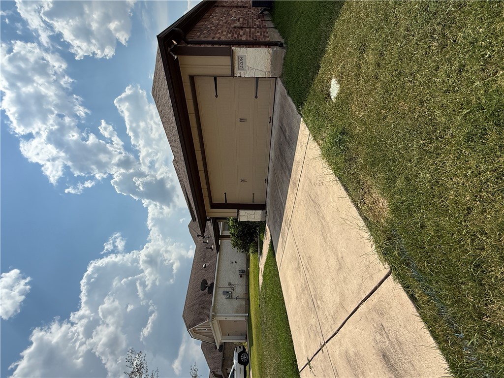 2208 Rindle Court Brenham, TX 77833 - Photo 14 of 22 a view of a backyard
