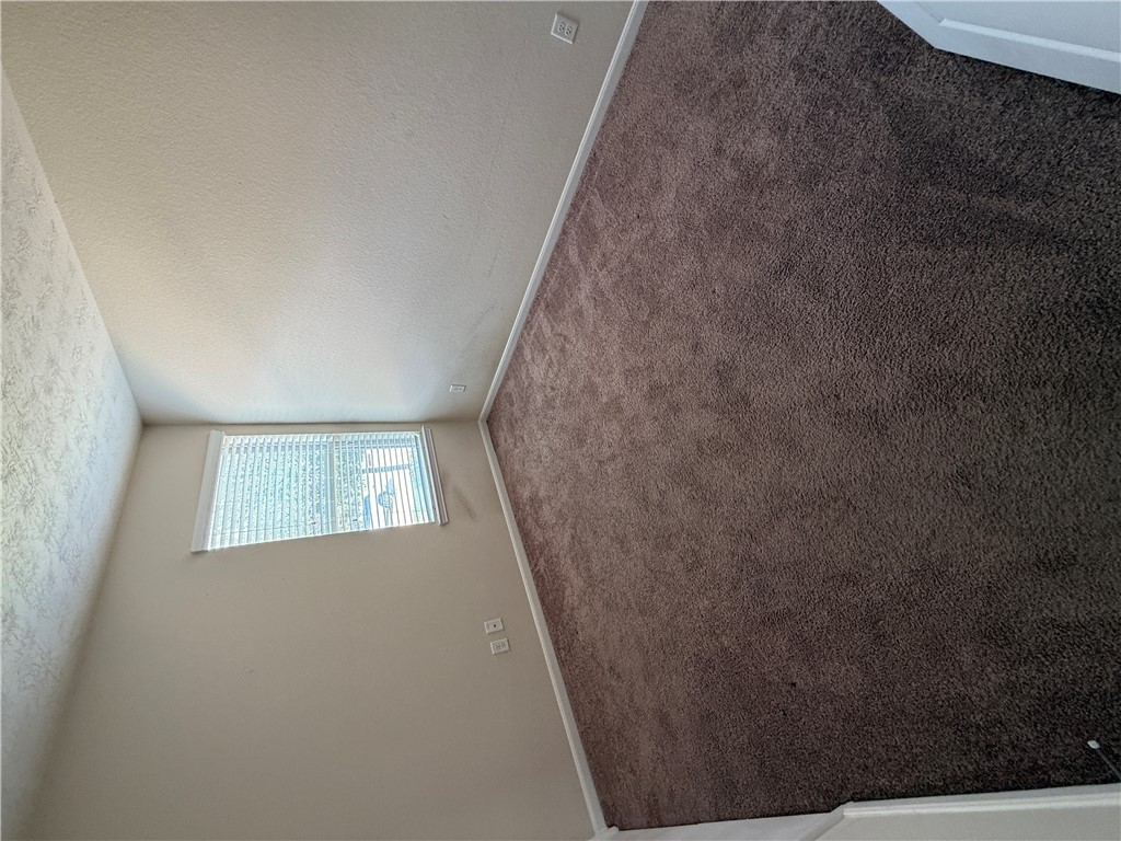 2208 Rindle Court Brenham, TX 77833 - Photo 10 of 22 an empty room with windows