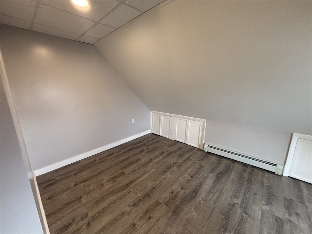 771 Rock Street Fall River, MA 02720 - Photo 22 of 31 a view of an empty room with wooden floor