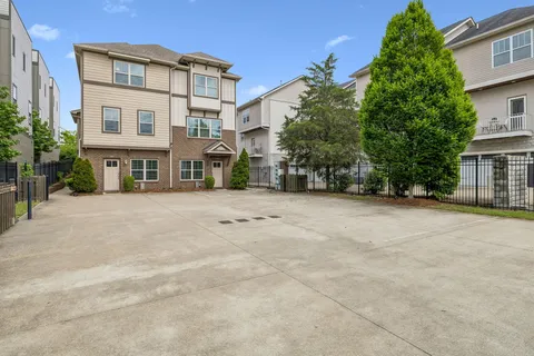front view of a building with a yard