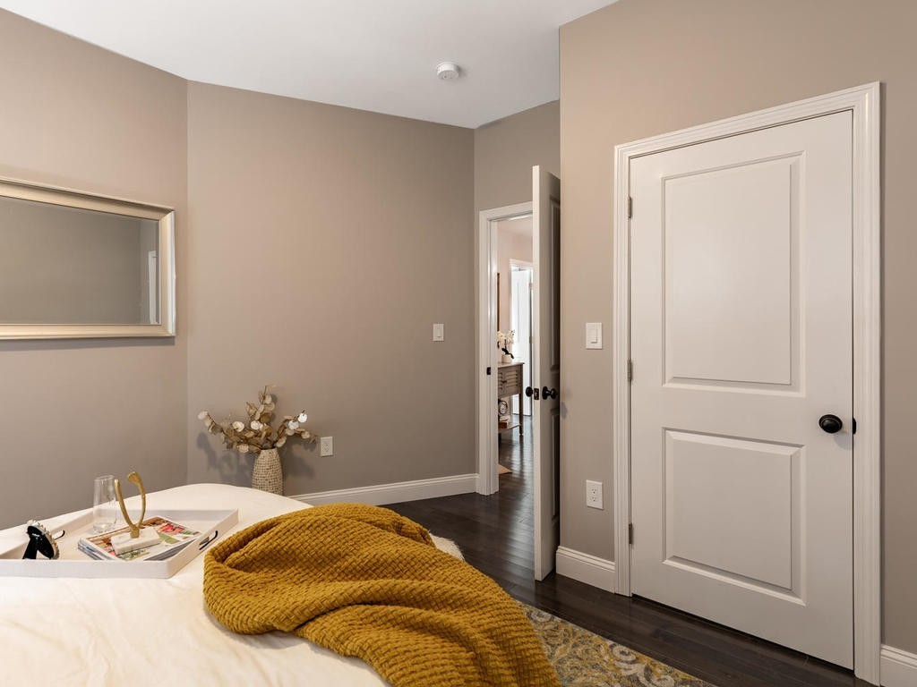 131 Congress Avenue, Unit 2 Chelsea, MA 02150 - Photo 15 of 30 a bedroom with a bed and hallway