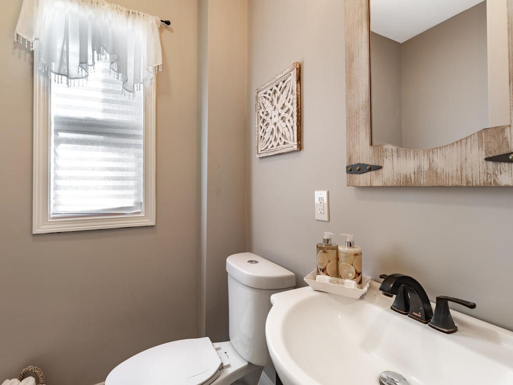 131 Congress Avenue, Unit 2 Chelsea, MA 02150 - Photo 23 of 30 a bathroom with a toilet sink and mirror