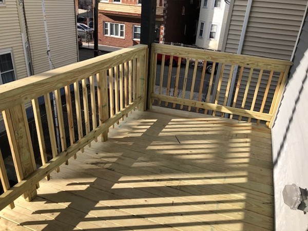 131 Congress Avenue, Unit 2 Chelsea, MA 02150 - Photo 25 of 30 a view of a building from a balcony
