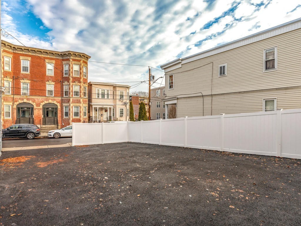 131 Congress Avenue, Unit 2 Chelsea, MA 02150 - Photo 30 of 30 a view of building with yard