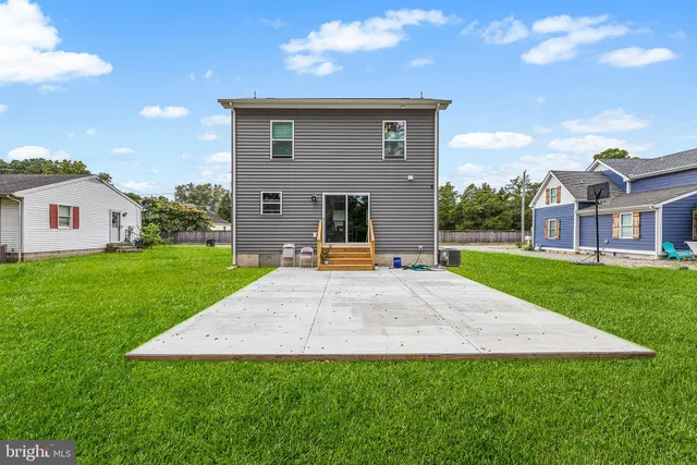 a view of outdoor space yard and front view of house
