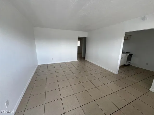 a view of an empty room and window