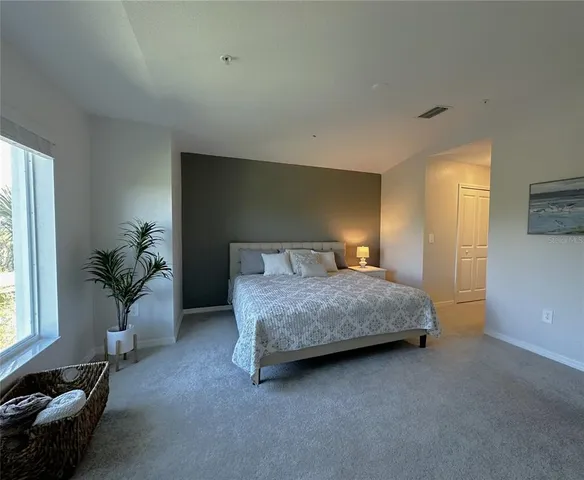 a bathroom with a double vanity sink and mirror