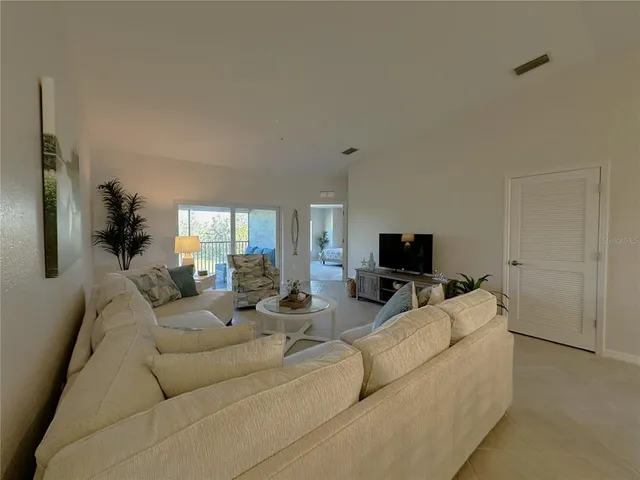 a bed room with a bed and a window