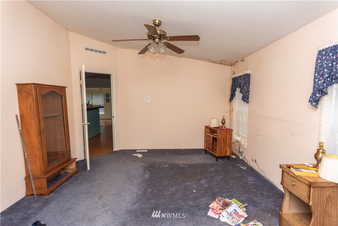 168 Katula Road Chehalis, WA 98532 - Photo 34 of 40 wooden floor in an empty room with a window