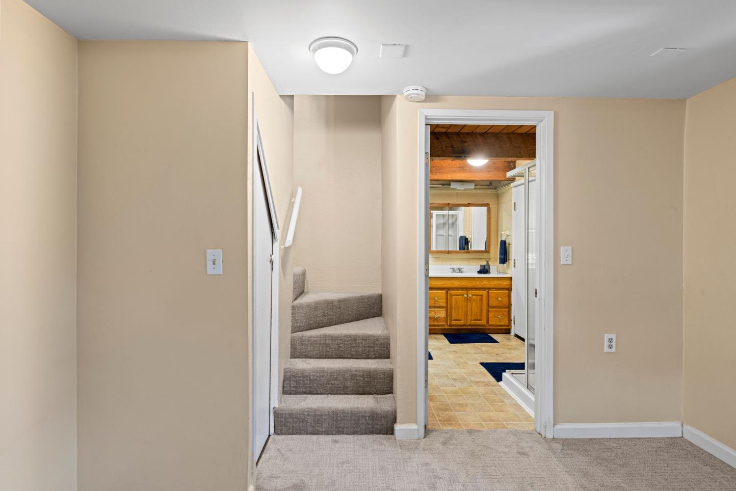 3220 Naomi Way Placerville, CA 95667 - Photo 25 of 57 a en suite bathroom with a sink and a mirror