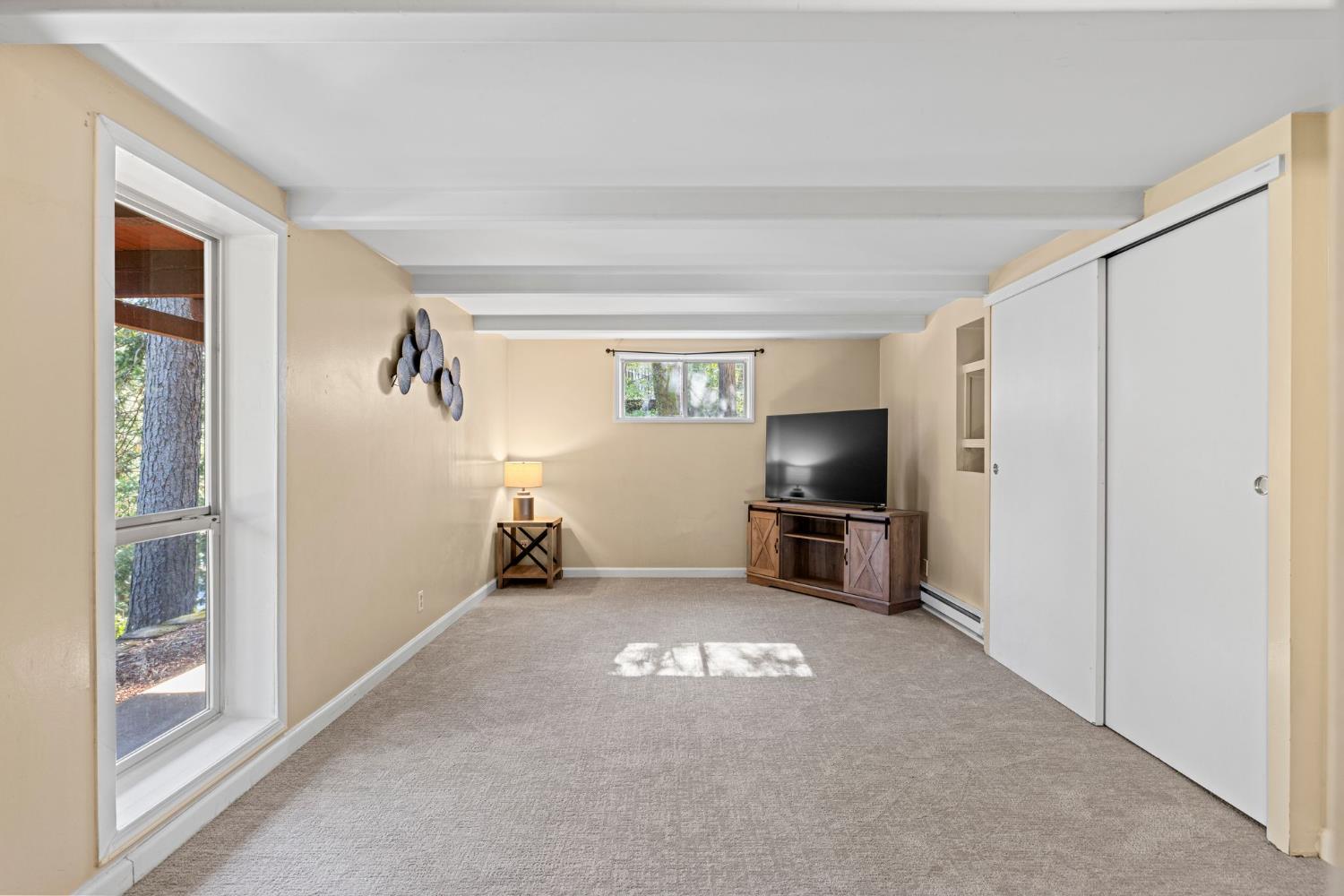 3220 Naomi Way Placerville, CA 95667 - Photo 26 of 57 a view of a livingroom with a flat screen tv