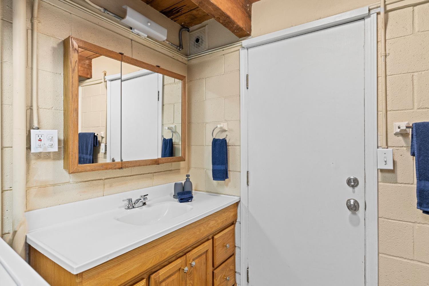 3220 Naomi Way Placerville, CA 95667 - Photo 31 of 57 a bathroom with a sink and a mirror