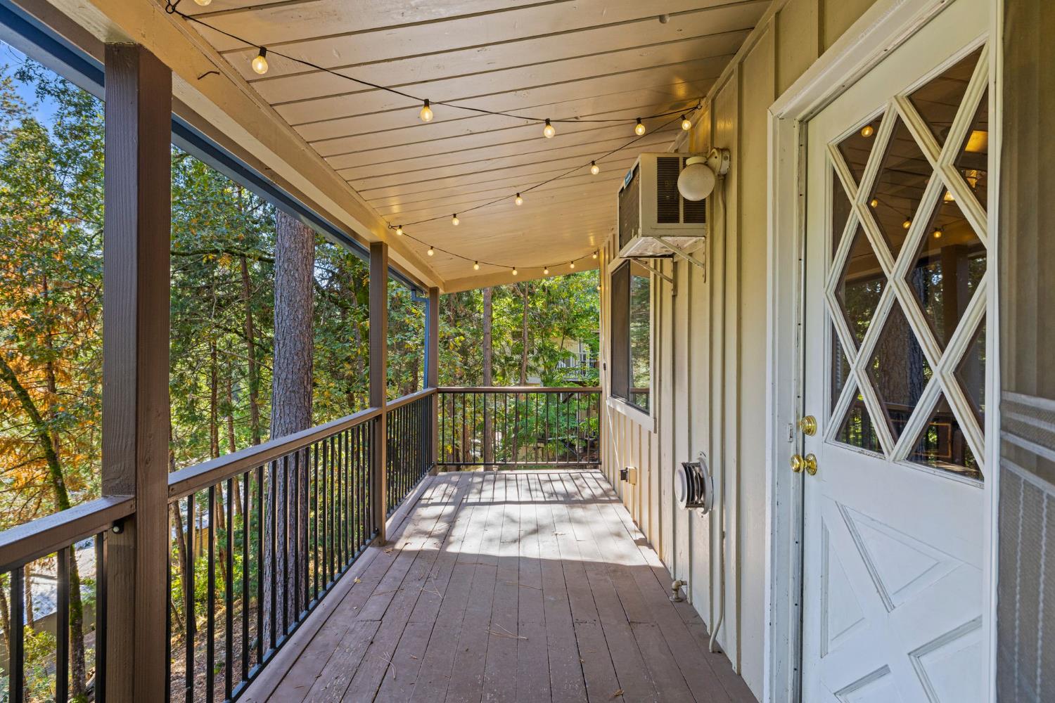 3220 Naomi Way Placerville, CA 95667 - Photo 33 of 57 a view of balcony with wooden floor and fence