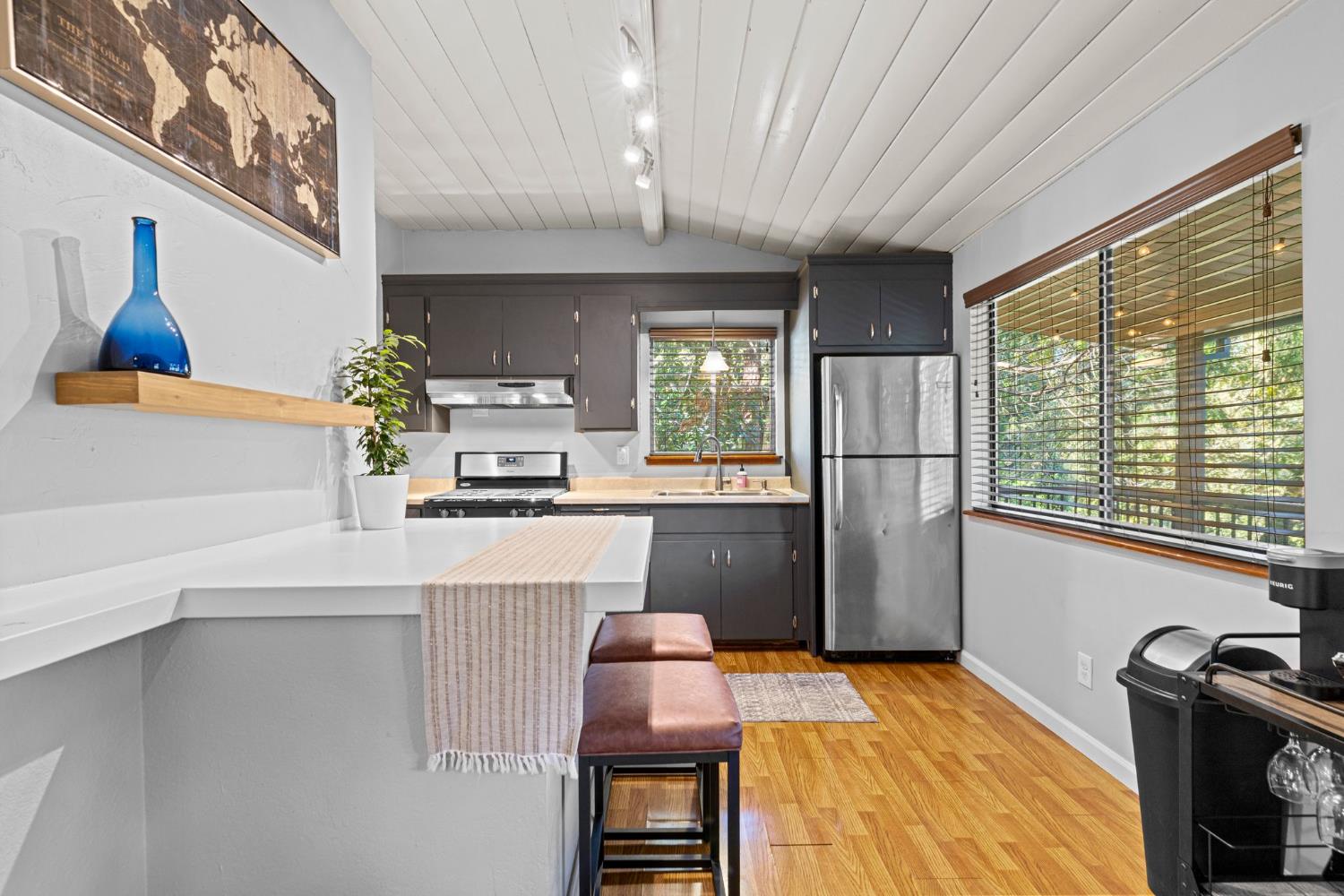 3220 Naomi Way Placerville, CA 95667 - Photo 7 of 57 a kitchen with a refrigerator and a stove