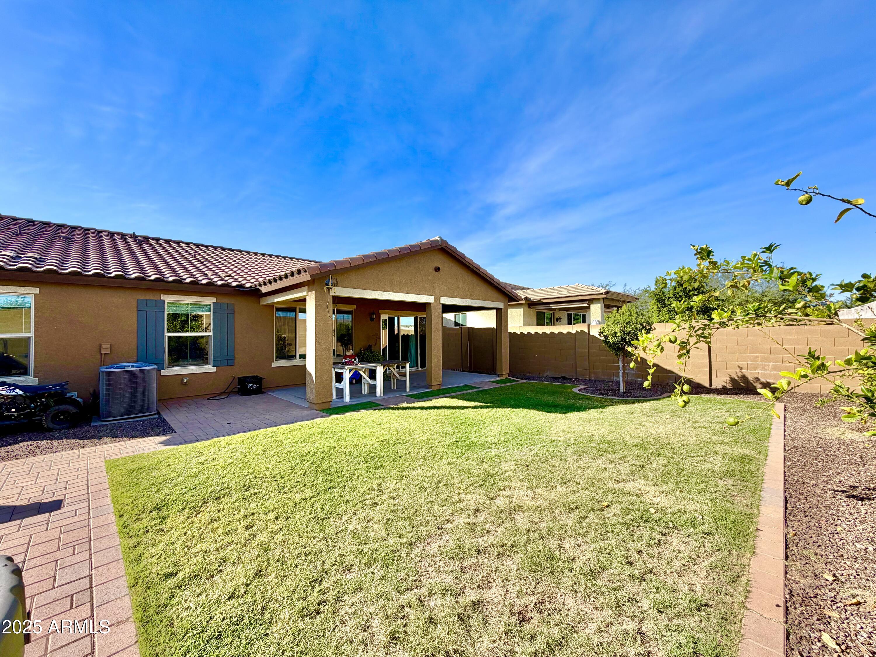 8208 West Sands Road Glendale, AZ 85303 - Photo 25 of 27 a view of a house with a yard