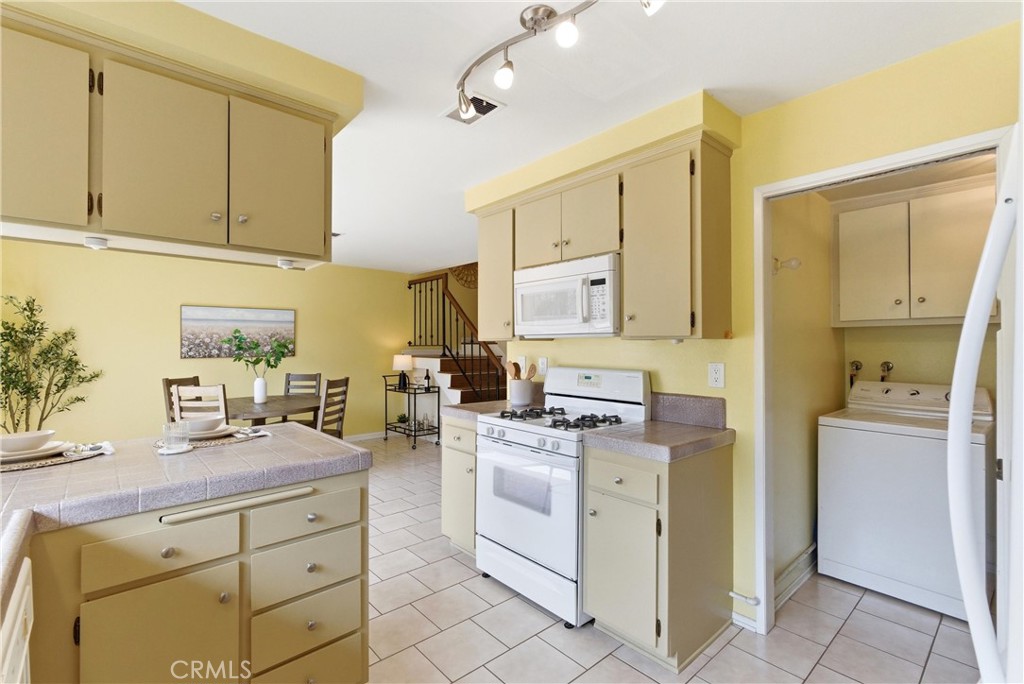 5021 Vauxhall Road Westminster, CA 92683 - Photo 10 of 38 Kitchen, Laundry Room, and Dining Room/Dining Area
