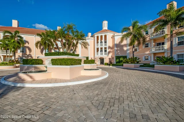 a view of a swimming pool and a patio